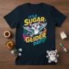 It's A Sugar Glider Day text with a cute cartoon sugar glider graphic on a dark t-shirt