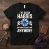 I've Eaten Haggis Nothing Scares Me Anymore text with Scottish lion and thistle graphic on a black t-shirt