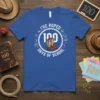 Blue t-shirt with white text "I've Roped 100 Days of School" and cowboy boot graphic, celebrating the 100th day of