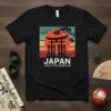 Japan Land of the Rising Sun t-shirt with vintage torii gate sunset and cherry blossoms graphic