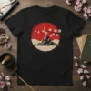 Japanese Cherry Blossom Landscape T-Shirt with red sun, rocks, and blooming sakura branches