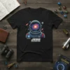 Black t-shirt with JEBE EXPLORER 689 astronaut design, featuring a helmet reflecting a colorful galaxy