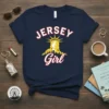 Navy blue t-shirt with "JERSEY Girl" text and Statue of Liberty graphic, representing New Jersey pride