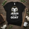 Black t-shirt with "Jesus Is The GOAT" text and a ram graphic, representing the primary keyword Jesus Is The GOAT