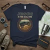 Jesus Is The Real Mud t-shirt featuring a vintage offroad Jeep climbing a muddy hill within a tire tread circle