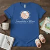 Blue t-shirt with white text "Jesus made her a Mama AND SHE WOULDN'T HAVE IT ANY OTHER WAY" and a