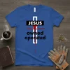 Jesus Owned Operated Christian T-Shirt with a white cross and red blood splatter design, featuring black text