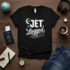 JET Lagged quote on a black t-shirt with moon, airplane, and clock graphics, perfect for travelers