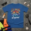 Jet Skiing Legend t-shirt with retro sunset, palm trees, and a rider on a jet ski