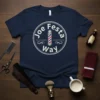 Joe Festa Way barber shop design on a navy blue t-shirt with barber pole graphic