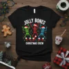 Jolly Bones Christmas Crew text with three dancing skeletons in Christmas lights and Santa hats on a black t-shirt