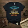 Dark t-shirt with cryptic text JONE WASTE YORE TOYE MONME YORALL REDIII THE VOICE INSOIDE MOYE YEDD in vintage colors