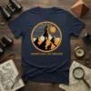 Navy t-shirt with 'Journey Into The Unknown' text and a circular graphic of a figure on a mountain peak with