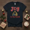 Joy To The World Christmas Nativity T-Shirt with Mary, Joseph, and baby Jesus graphic