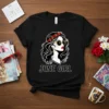 Black t-shirt with "June Girl" text and a stylized woman's profile wearing sunglasses and a flower crown