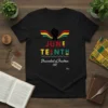 Black t-shirt with "JUNE TEENTH Descendant of Freedmen 1865" text and Pan-African flag wings with a raised fist graphic