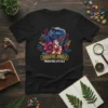 Jurassic Jungle Predators & Petals t-shirt with a blue raptor dinosaur head surrounded by colorful flowers and leaves
