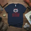 Navy blue t-shirt with white and red "Jus Drein Jus Daun" text and circular graphic