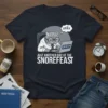 Just Another Day At The Snorefeast cat t-shirt design with a sleepy cat at a laptop showing 08:00 AM