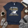 Just Because I'm Awake Doesn't Mean I'm Ready To Do Things sloth design with coffee cup on navy t-shirt
