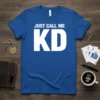 Royal blue t-shirt with white bold text: "JUST CALL ME KD". Features the primary keyword "Just Call Me KD"