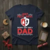 Navy blue t-shirt with red and white text "JUST FELIZ NAVI BECAUSE I DON'T HAVE A DAD" and holiday graphics
