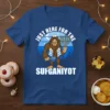 Bigfoot holding a menorah and dreidel, text says "Just Here For The Sufganiyot", Hanukkah theme