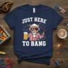 Just Here To Bang patriotic cat t-shirt with fireworks and beer graphic. Features a cat in colonial attire holding a