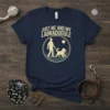 Just Me And My Labradoodle t-shirt with a graphic of a person walking a doodle dog in grass