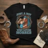 Just a Boy Who Loves Horses t-shirt design featuring a boy hugging a horse, with Western-style rope and horseshoe accents