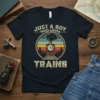 Just A Boy Who Loves Trains t-shirt with vintage train graphic and retro sunset stripes