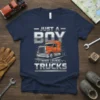 Just A Boy Who Loves Trucks t-shirt with orange semi-truck graphic and bold silver lettering