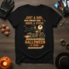 T-shirt with text "JUST A GIRL WHO KNOWS HOW DRIVE A STICK! HALLOWEEN IS HERE!" and a witch riding a