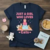 Just A Girl Who Loves Cats t-shirt featuring a girl in hijab surrounded by cats, with pink and yellow stars