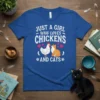 Just A Girl Who Loves Chickens And Cats text design with chicken and cat graphics, white text on blue shirt
