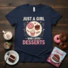 T-shirt with "JUST A GIRL WHO LOVES DESSERTS" text and illustrations of donuts, cupcakes, and cake