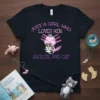 Just A Girl Who Loves Her Axolotl And Cat text design with pink axolotl holding a grey cat, wearing a