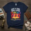 Just A Girl Who Loves Musicals text design with a stage, spotlight, and musical notes graphic