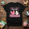Just a Girl WHO LOVES PECKERS text with pink and white chickens on a black t-shirt design