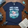 Just A Girl Who Loves Sharks text with a cartoon shark wearing sunglasses and a bandana, surrounded by smaller sharks