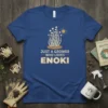 Enoki mushroom graphic with text "JUST A GROWER WHO LOVES ENOKI" on a blue t-shirt
