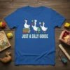Just A Silly Goose quote with cartoon geese dressed as a scholar, chef, and explorer on a blue t-shirt