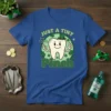 Just a Tiny Pinch St. Patrick's Day t-shirt with a smiling tooth wearing a leprechaun hat and holding a magic