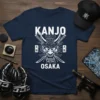 Kanjo Osaka t-shirt design featuring a white oni mask with circuit board details and crossed katana swords