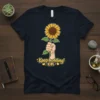 Keep Holding On quote with sunflower graphic on a navy t-shirt, motivational design