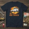 Navy t-shirt featuring a white Kei truck with orange and yellow flames graphic and "KEI TRUCK" text