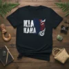 Kia Kaha Maori design t-shirt with distressed white text and a half blue, half red face mask graphic