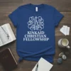 Kincaid Christian Fellowship text logo in white on a royal blue t-shirt, featuring a stylized church steeple and circular design