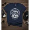 Navy t-shirt with white text that reads "KINDA CLASSY KINDA HOOD" in a circular design with decorative elements