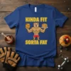 Kinda Fit Sorta Fat text with a muscular cartoon bear holding pancakes and a honey pot on a blue t-shirt